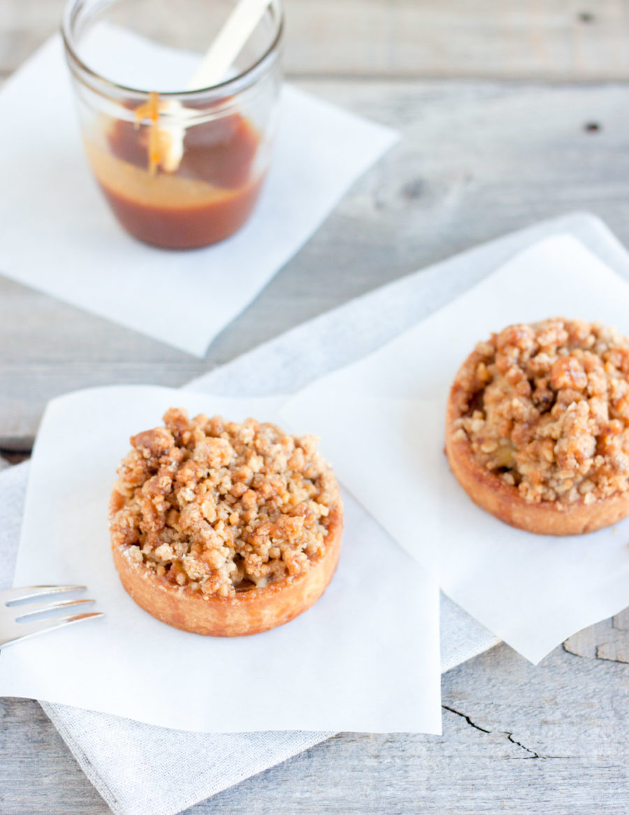 Individual-sized apple crumble with spiced apples and a buttery streusel topping, perfect for any occasion or a sweet treat